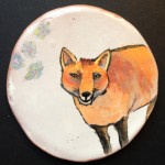 Red fox decorative item using maiolica technique.